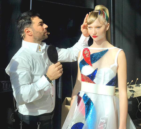 creating-show-looks-richard-mannah Hair stylist Richard Mannah styling models hair at hair show
