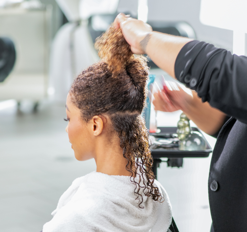 curly hair being treated