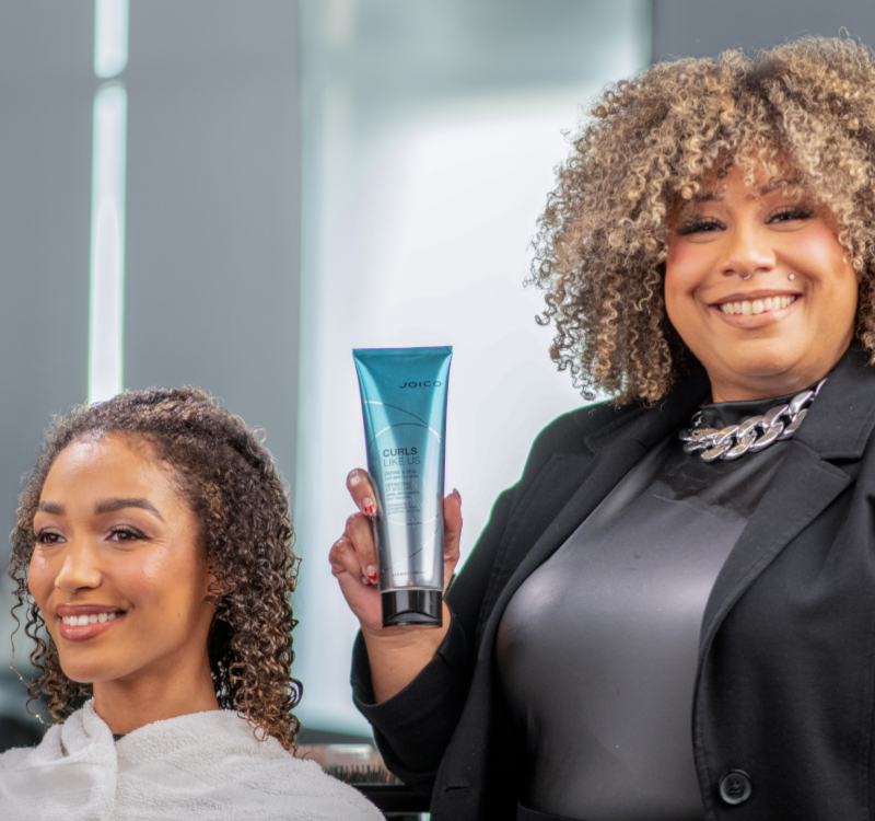 jeannetta with hair model holding product