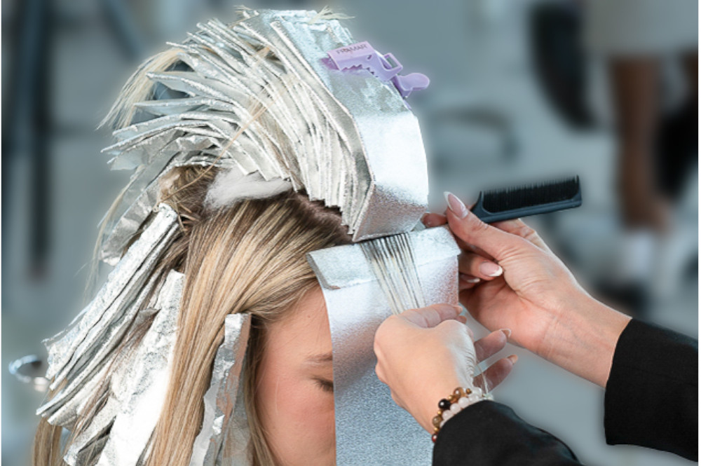 olivia applying formula to hair