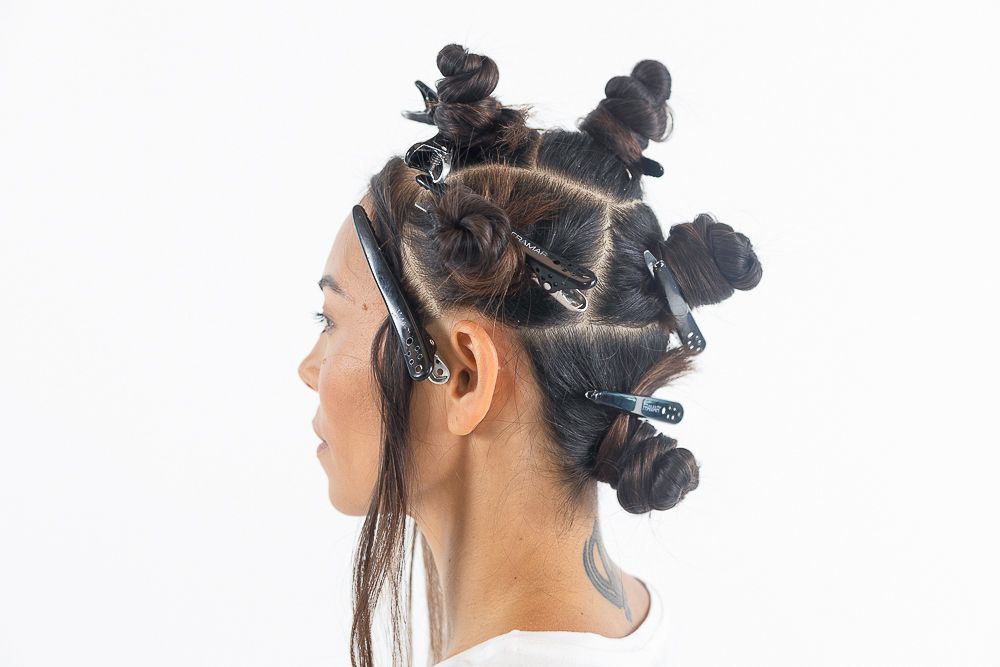 hair model with hair sectioned off