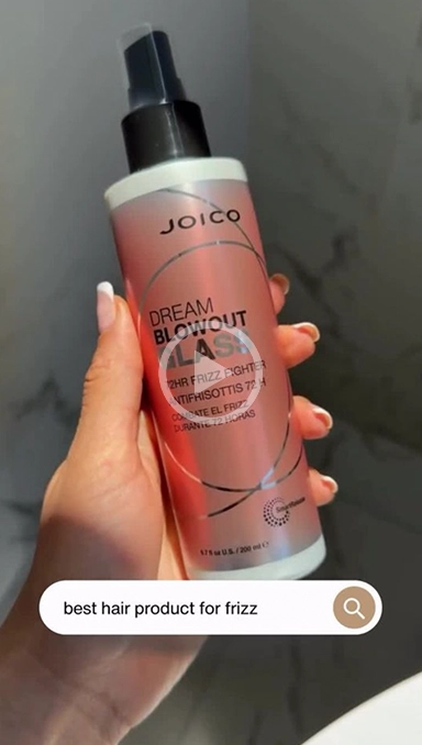 Joico ahir spray bottle held in hand