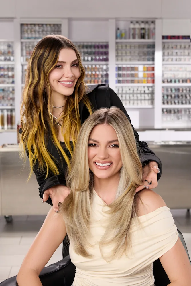 Larisa Love showing happy woman's colored hair